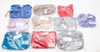 Kipling. A group of handbags, including