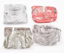 Kipling. A group of four small handbags,