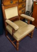 An Edwardian walnut open armchair, the u