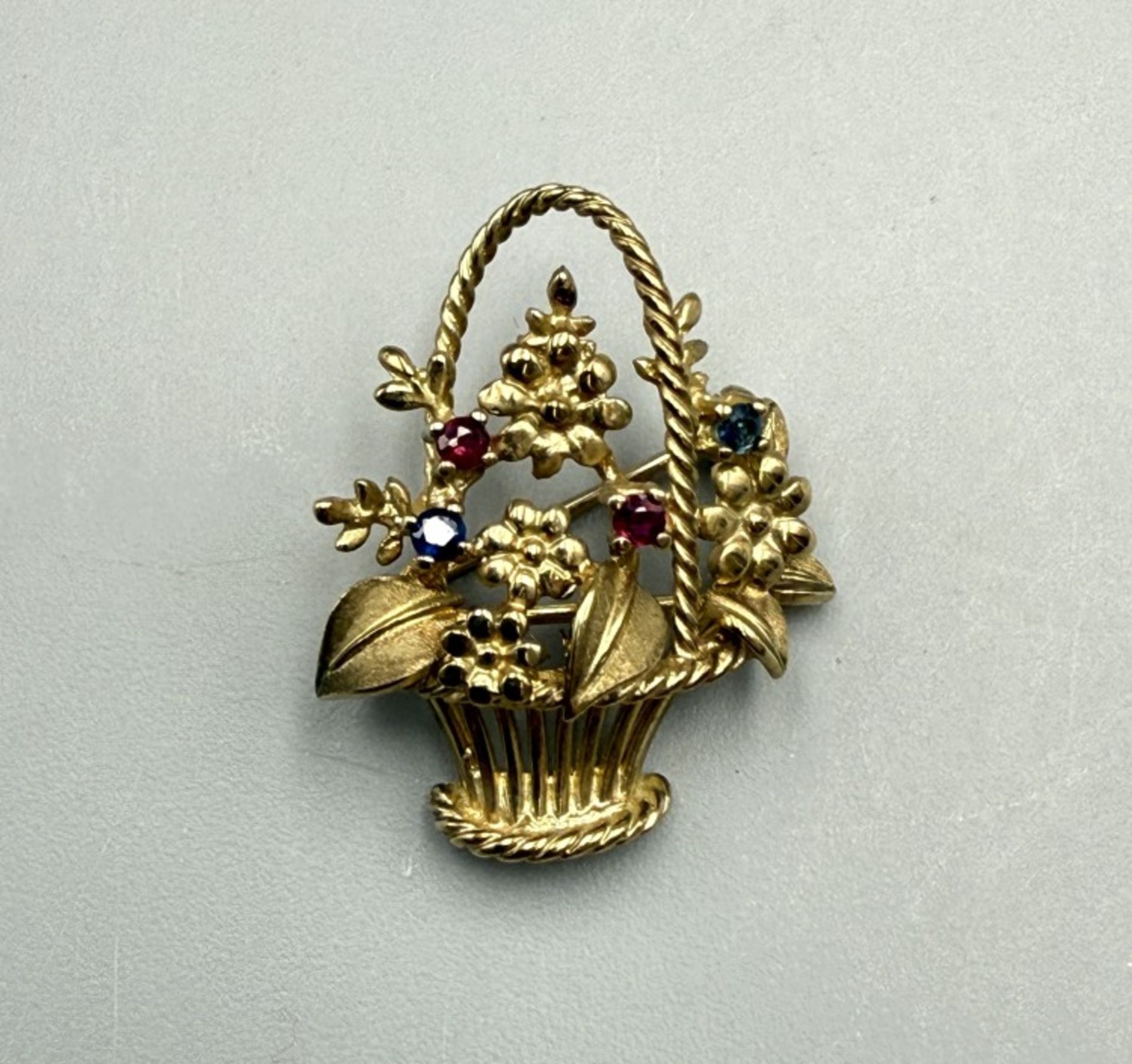 Brosche 1 Brosche mit farbigen Steinen, 333er Gold, Brutto ca. 4 g (25)