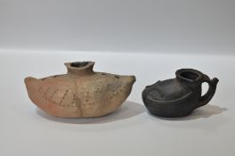 A Red Pottery Boat-form Flask, Neolithic Style. And a Black Pottery Boot