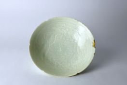 A Rare Qingbai Carved Dragon Lobed Bowl, Southern Song dynasty