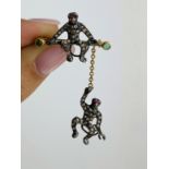 Rose Cut Diamond and Ruby Eye Double Hanging Monkey Brooch in Silver and Gold