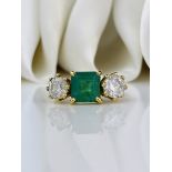 Art Deco Emerald and 2 carat Diamond 18 Carat Gold Three-Stone Ring