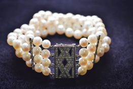 4 ROW AKOYA PEARL BRACELET WITH ART DECO 14K WHITE GOLD DIAMOND & SAPPHIRE SET CLASP