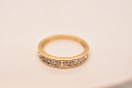 18K YELLOW GOLD CHANNEL SET DIAMOND 1/2 ET RING 0.75CT 3.5G