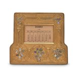 TIFFANY STUDIOS 'ABALONE' PATTERN PERPETUAL DESK CALENDAR New York, New York, c. 1910, gilt bron...