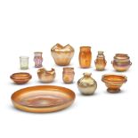 NINE TIFFANY STUDIOS GOLD FAVRILE MINIATURE WARES AND THREE ART GLASS VASES New York, New York, ...