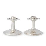 PAIR OF LIBERTY & CO. STERLING SILVER CANDLESTICKS London, 2004, impressed stamp mark 'Ly & Co' ...