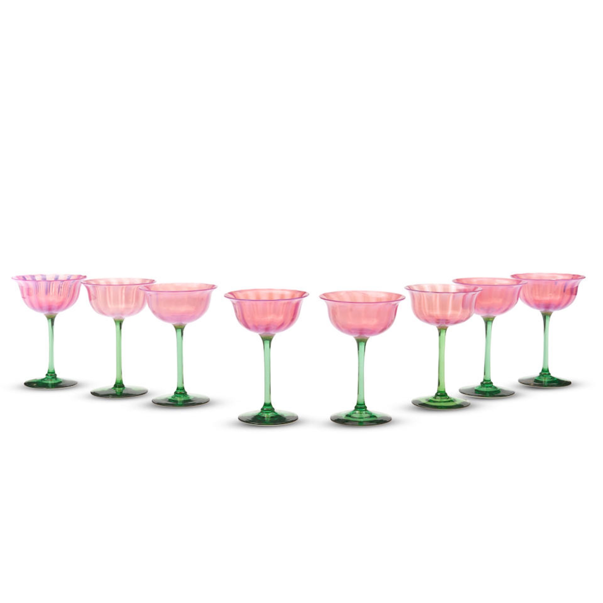 EIGHT STEUBEN ORIENTAL POPPY AND POMONA GREEN GLASS CHAMPAGNE COUPES Corning, New York, c. 1925,...