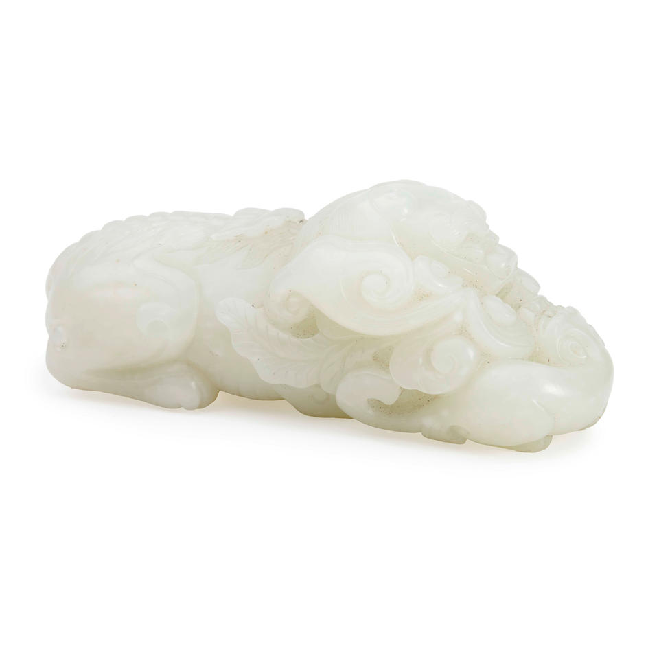 A WHITE JADE CARVING OF A SHISHI WITH CUB China, 20th century - Image 2 of 3