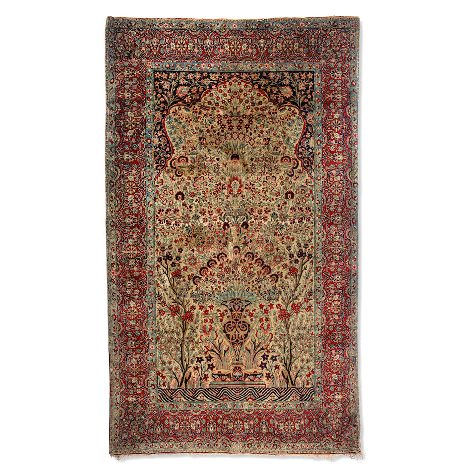 A Kirman 'Tree of Life' prayer rug South central Persia, circa 1900 204cm x 138cm