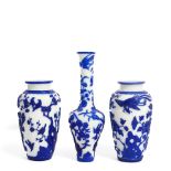 THREE LARGE BLUE OVERLAY 'BIRD AND FLOWER' PEKING GLASS VASES 20th century, the long-neck vase ...