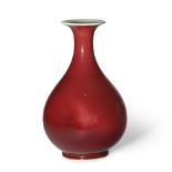 A COPPER-RED GLAZED PEAR-SHAPED VASE, YUHUCHUNPING 18th/19th century