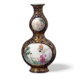 A BLUE-GROUND GILT-DECORATED PAINTED PORCELAIN WALL VASE Qianlong mark, Republic period (box)