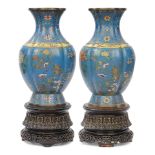 A PAIR OF MASSIVE CLOISONNÉ-ENAMEL LOBED VASES Late Qing dynasty (2, wood stand for each)
