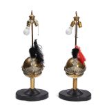 TWO HELMET-MOUNTED TABLE LAMPS, 20th Century,