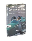 Arthur Baker: Jim Clark At The Wheel; a first edition signed by Jim Clark,