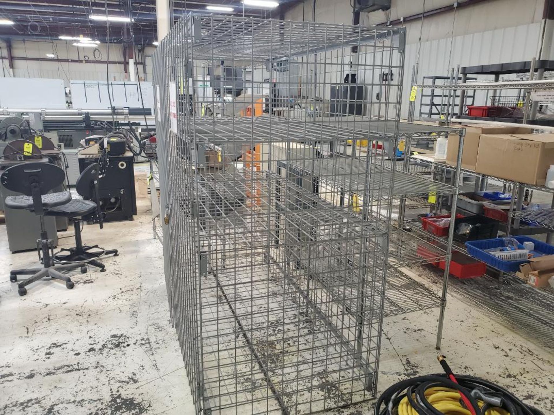 Lockable materials cage. 72in wide x 36in deep x 72in tall.