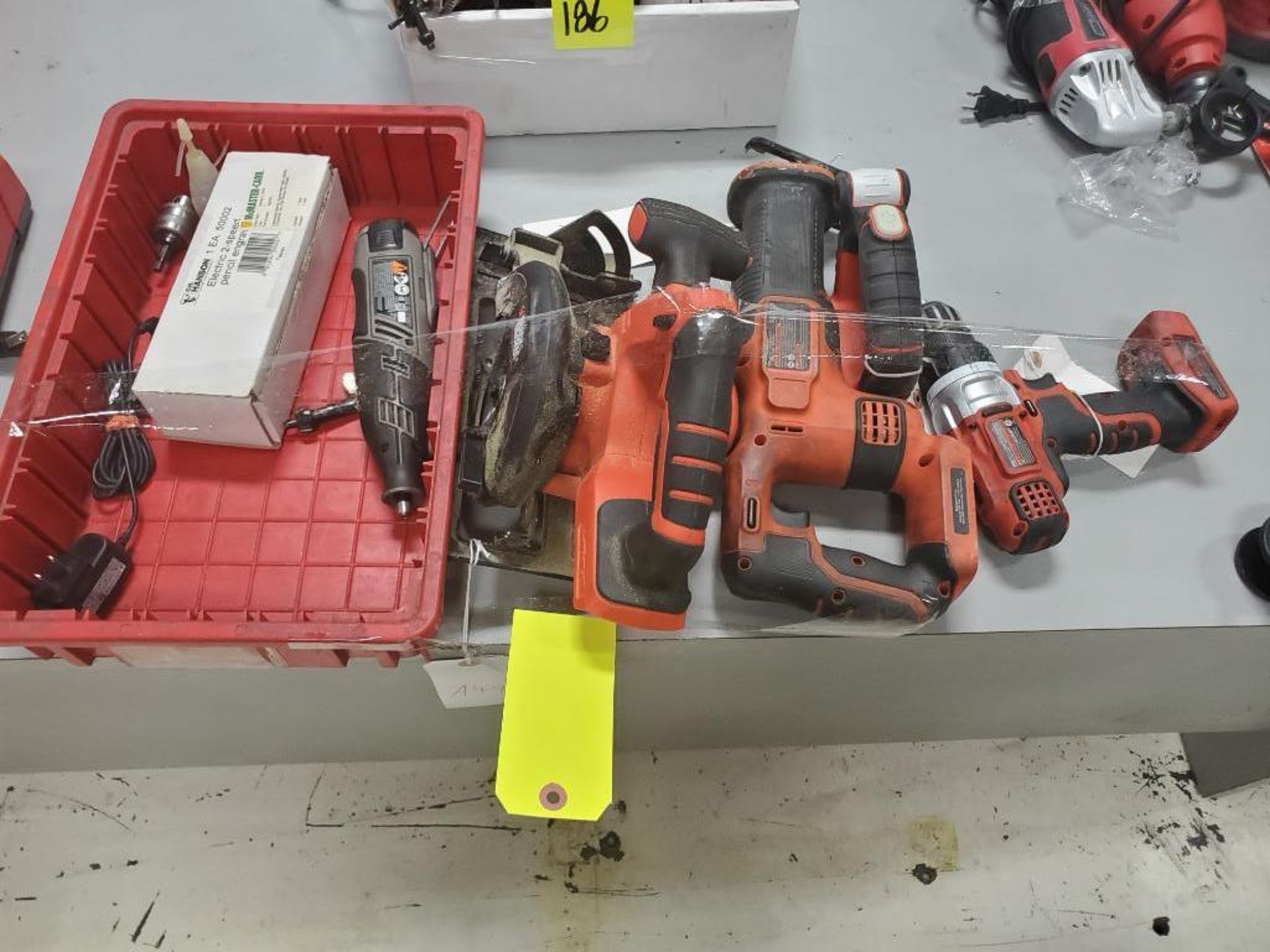 Assorted cordless power tools.