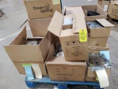 Pallet of assorted lighting and other parts.