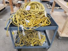 Shop cart with large qty of electrical cords.