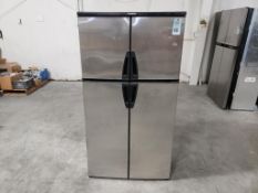 3 way Dometic refrigerator. Model RM1350MSSX.