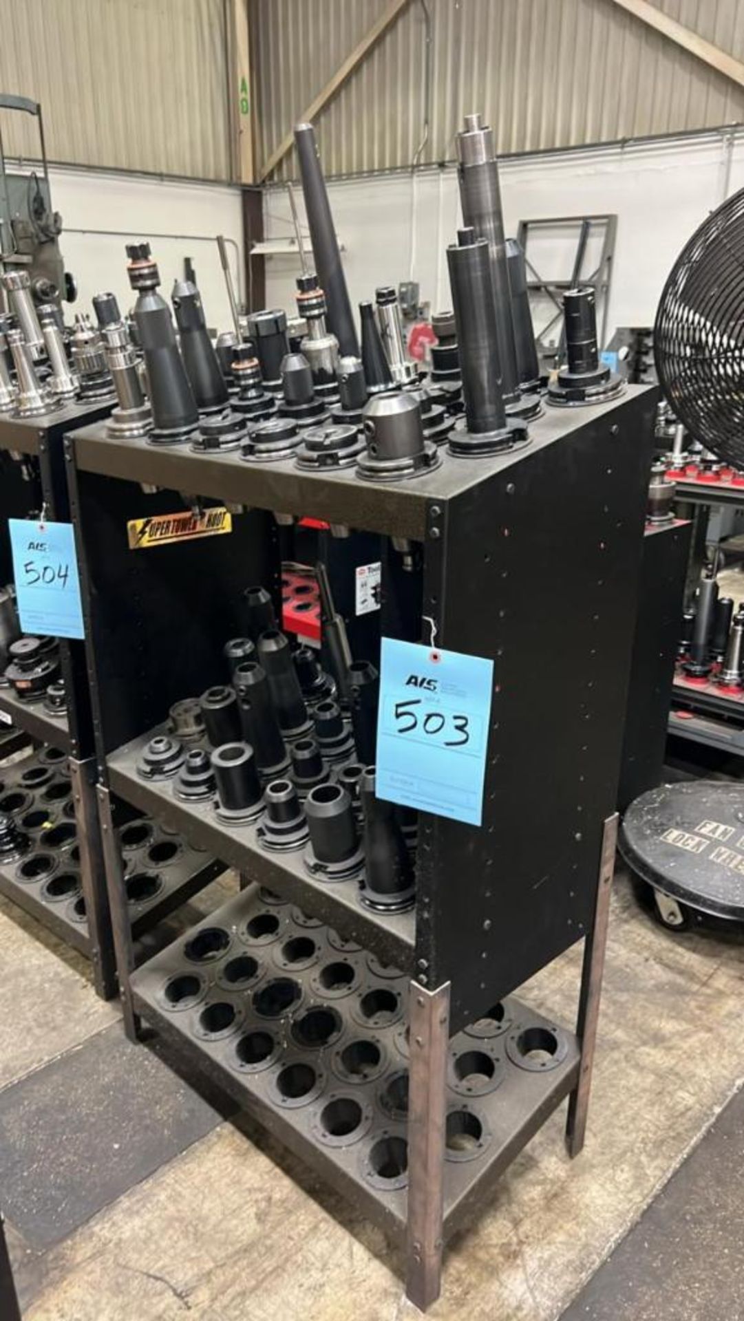 LOT: (52) Cat 50 Tool Holders & misc tooling w/ Rack