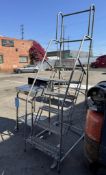 Lot Consisting of : (1) Stainless Steel Portable Desk, (1) 6ft Rolling Ladder.