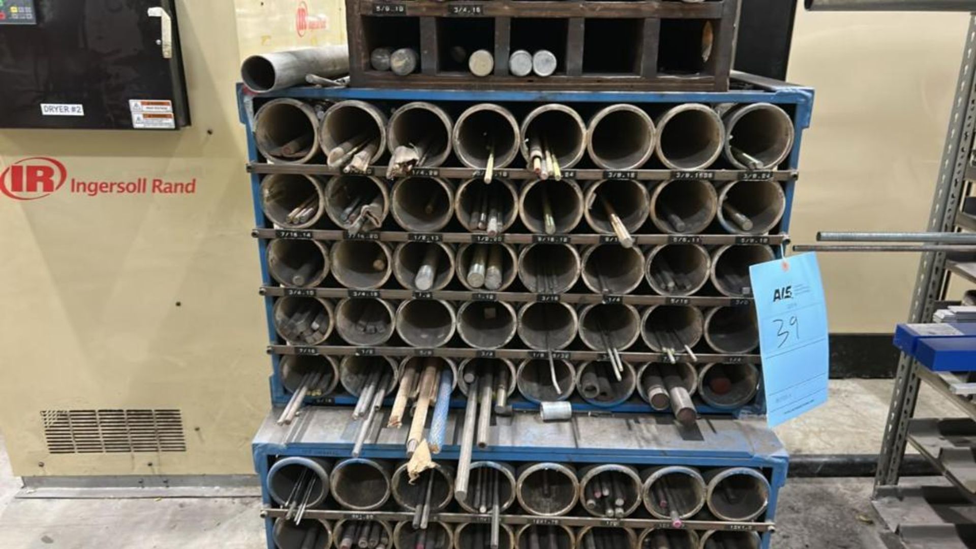Portable Metal Storage Rack with Assorted Metal Rods. **NO CONTENTS**