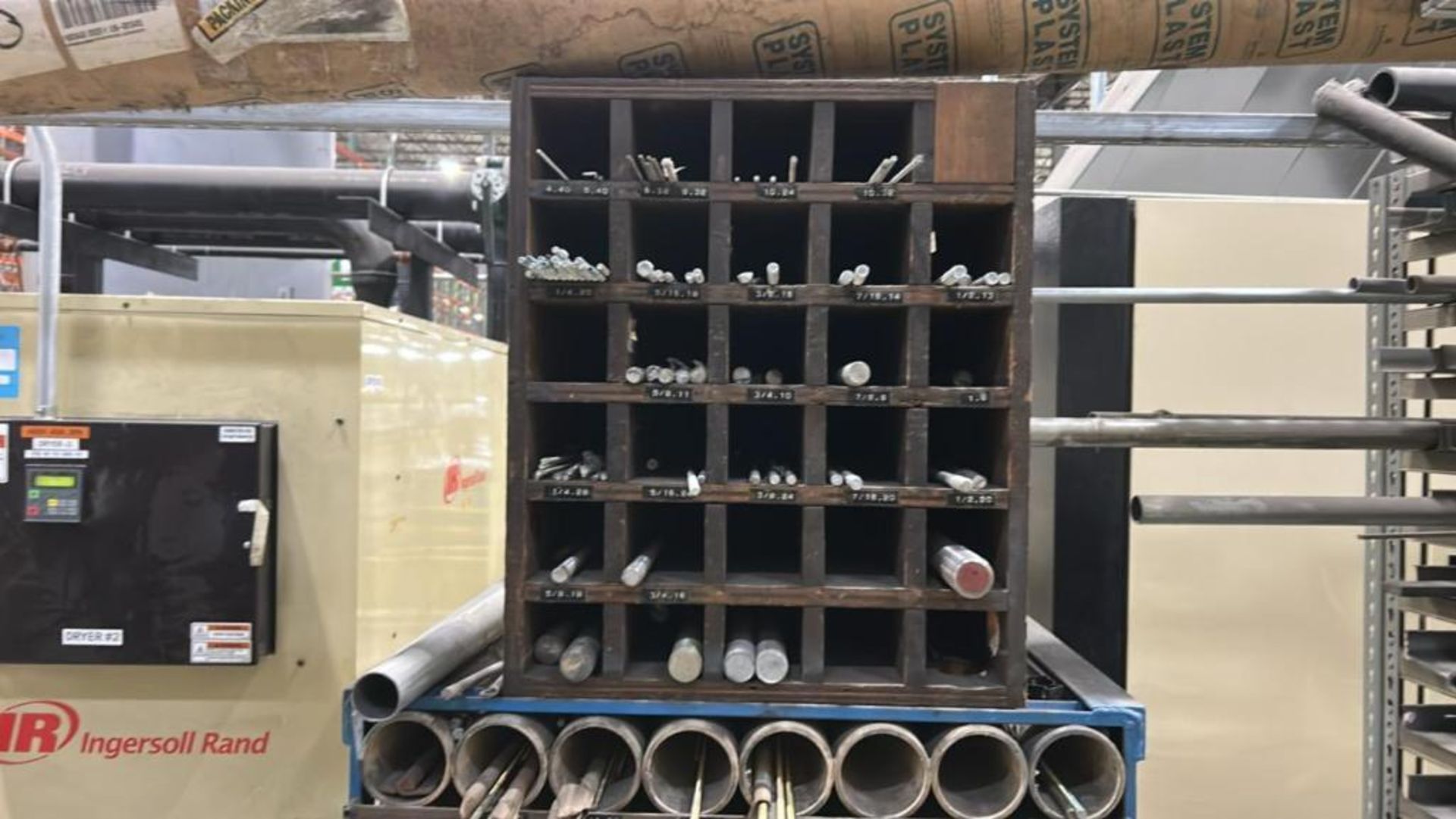 Portable Metal Storage Rack with Assorted Metal Rods. **NO CONTENTS**