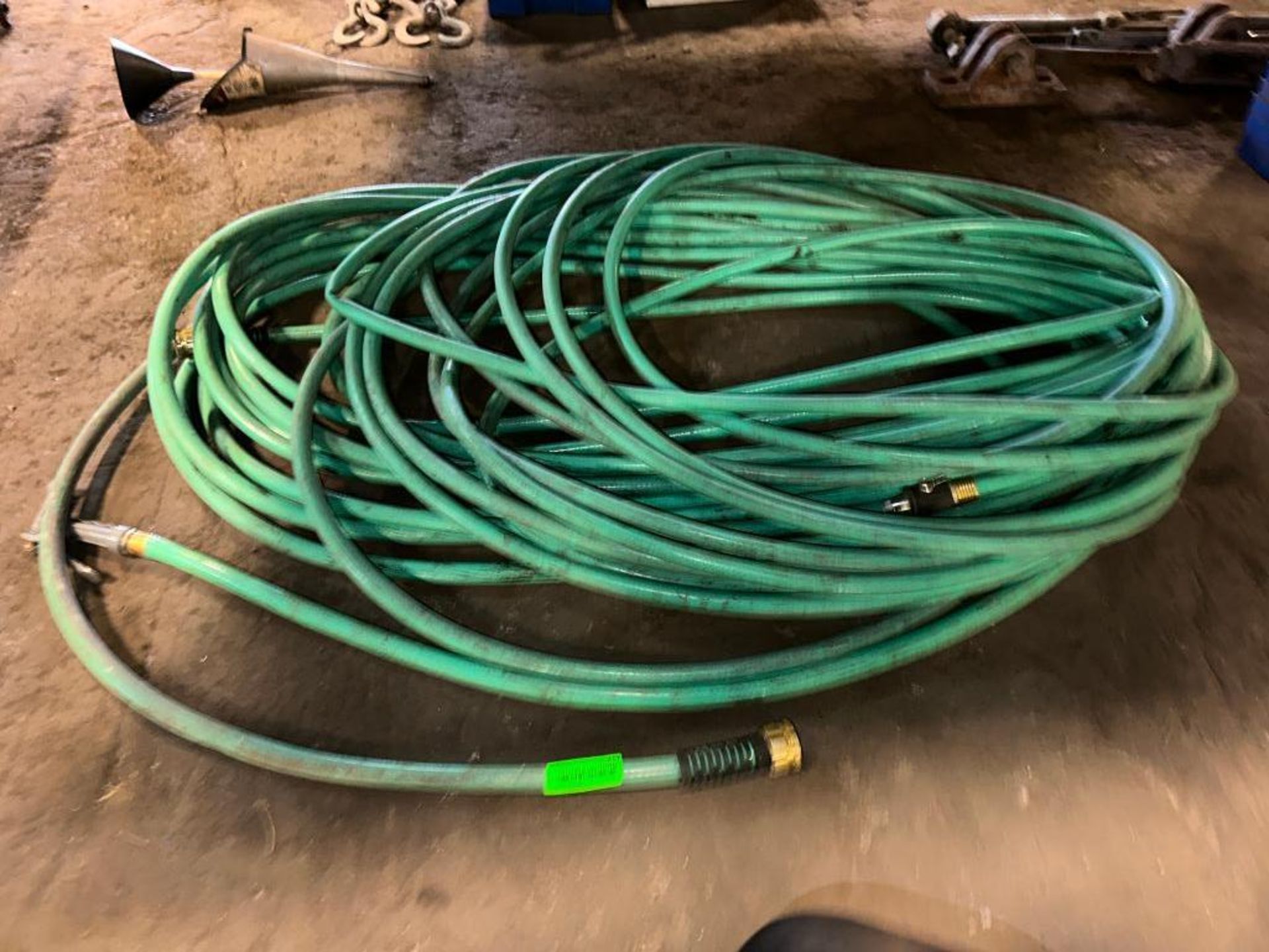 DESCRIPTION: GARDEN HOSE ADDITIONAL INFORMATION: APPROX. 100FT LOCATION: SHOP QTY: 1