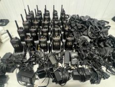 Lot of (25) Kenwood Radios w/Batteries, Charging Bases, Charging Cables & Remote Speaker Microphones