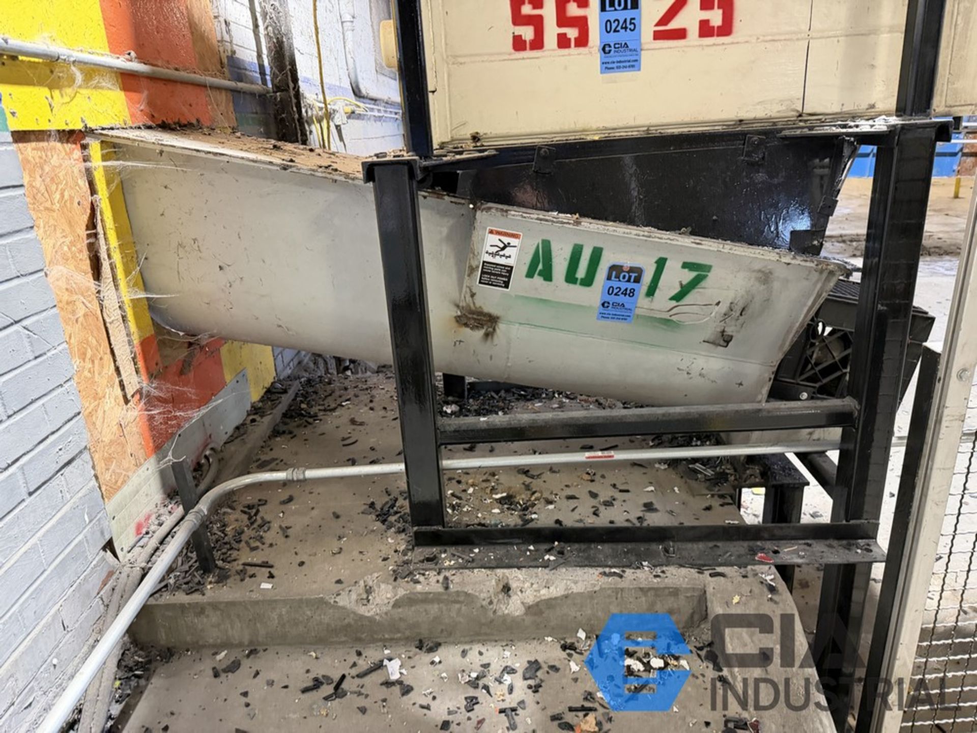 38' LONG (APPROX.) STAND MOUNTED THROUGH WALL TO COMPACTOR INCLINE ...