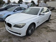 2012 BMW 740Li sedan, 157,685 miles showing WBAKB4C5XCC575434 Engine lights are on