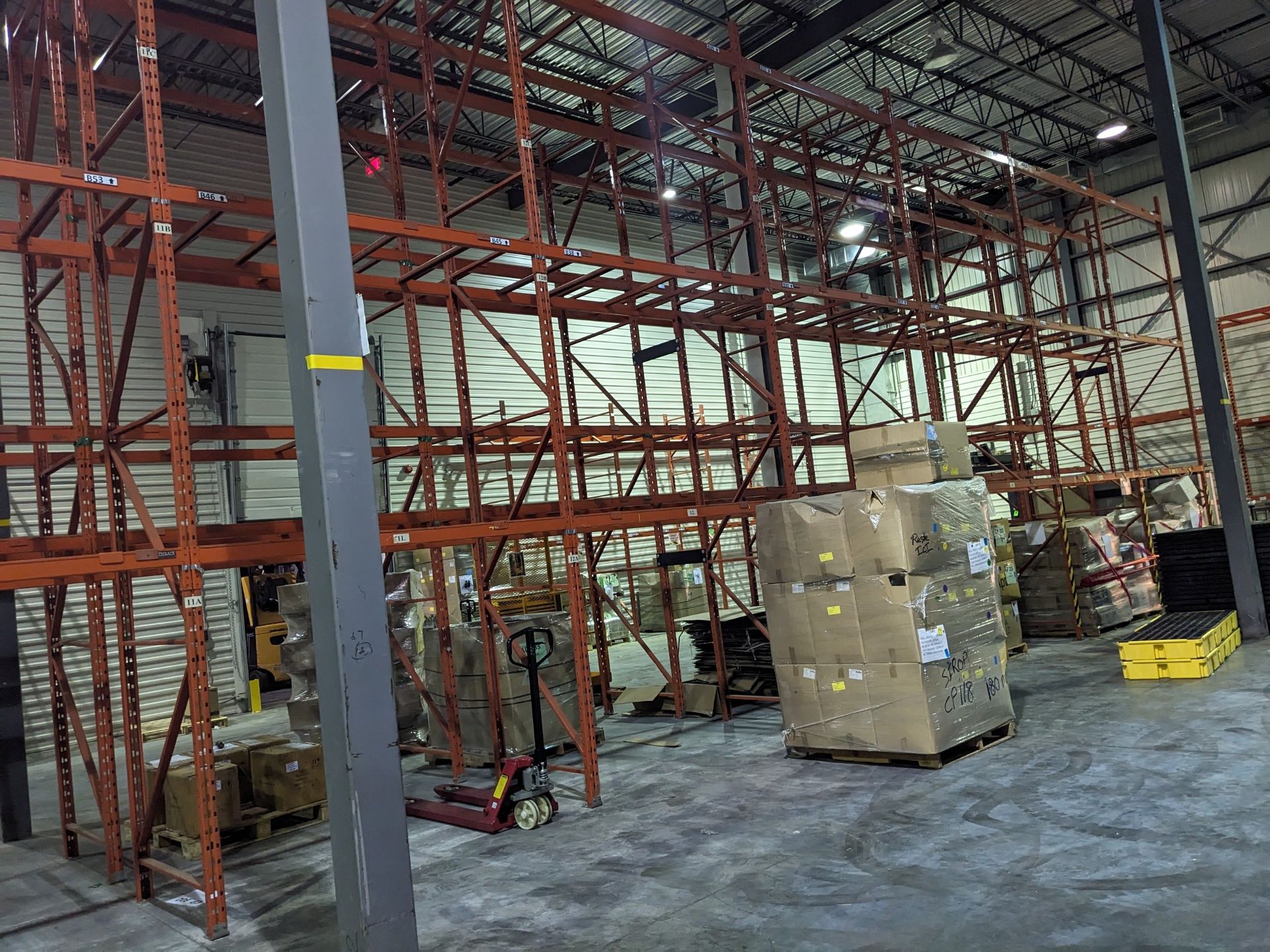 Lot of (18) sections of REDIRACK industrial pallet racking, 2 separate ...