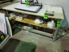 Metal Worktable with Plywood Shelf, Surface (Contents Not Included)Approx. dimensions: 67" W x 36" D