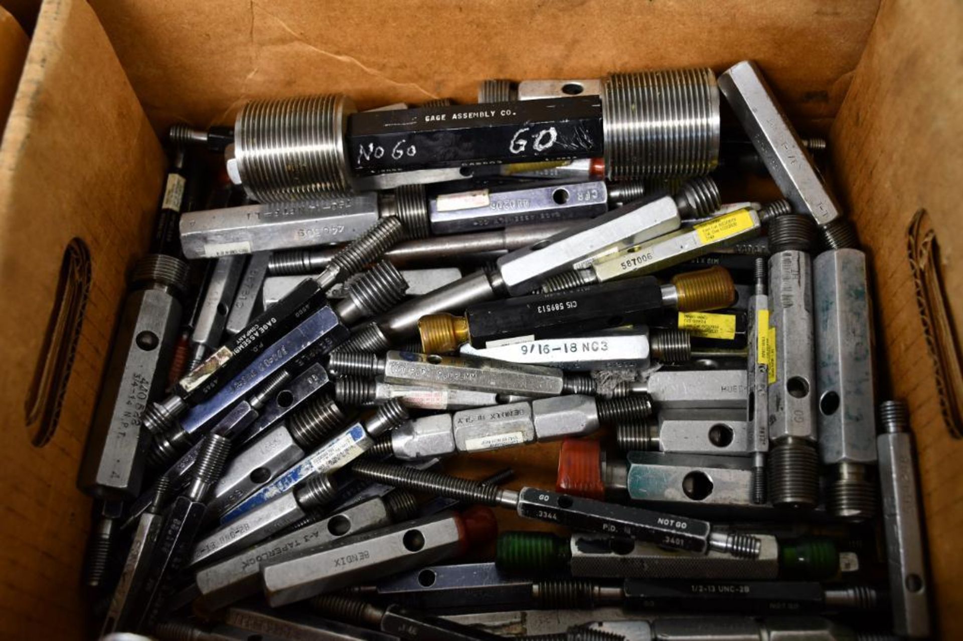 BOX FULL OF ASSORTED THREAD PLUG GAUGES
