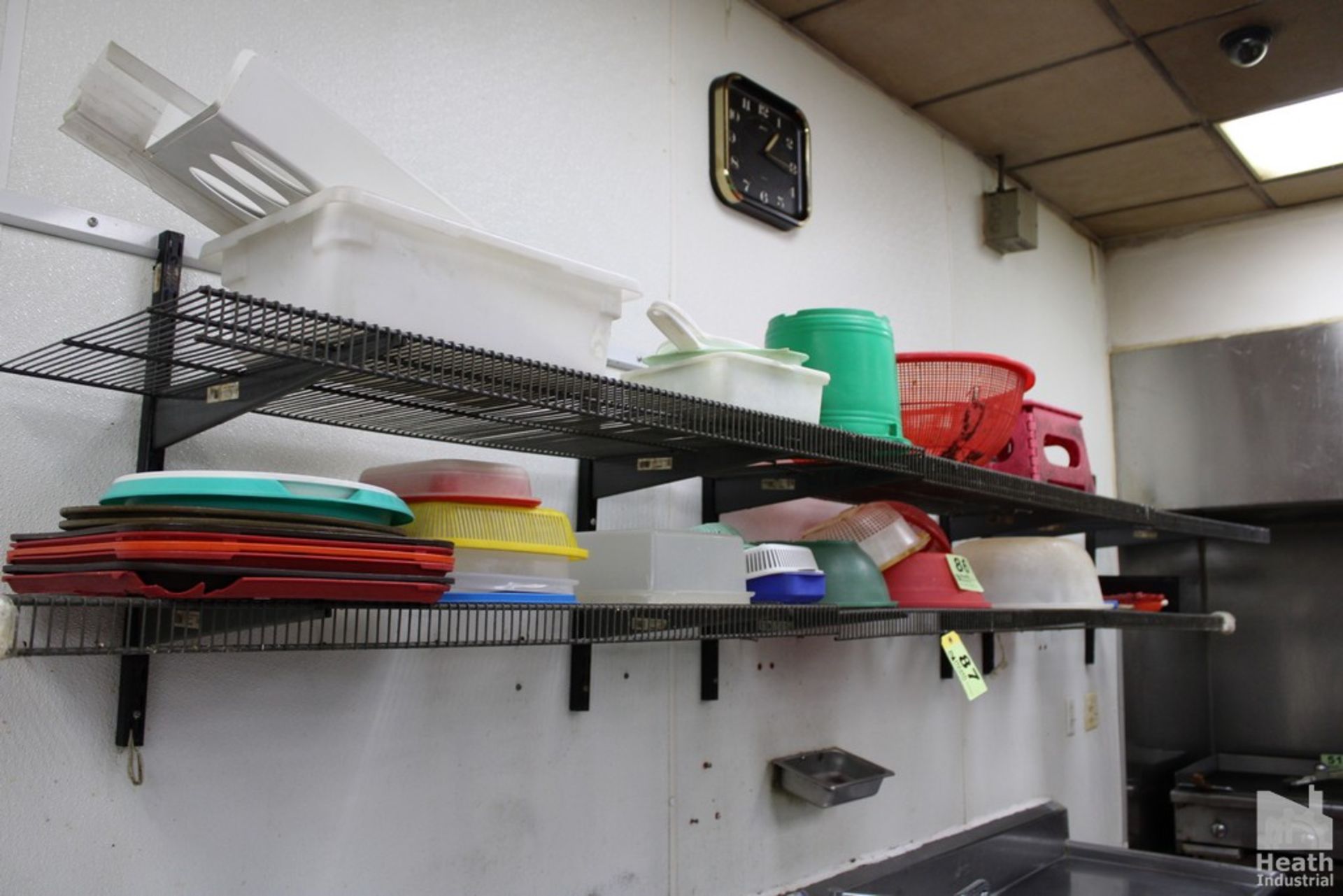 ASSORTED PLASTIC DISHES ON TWO WIRE SHELVES