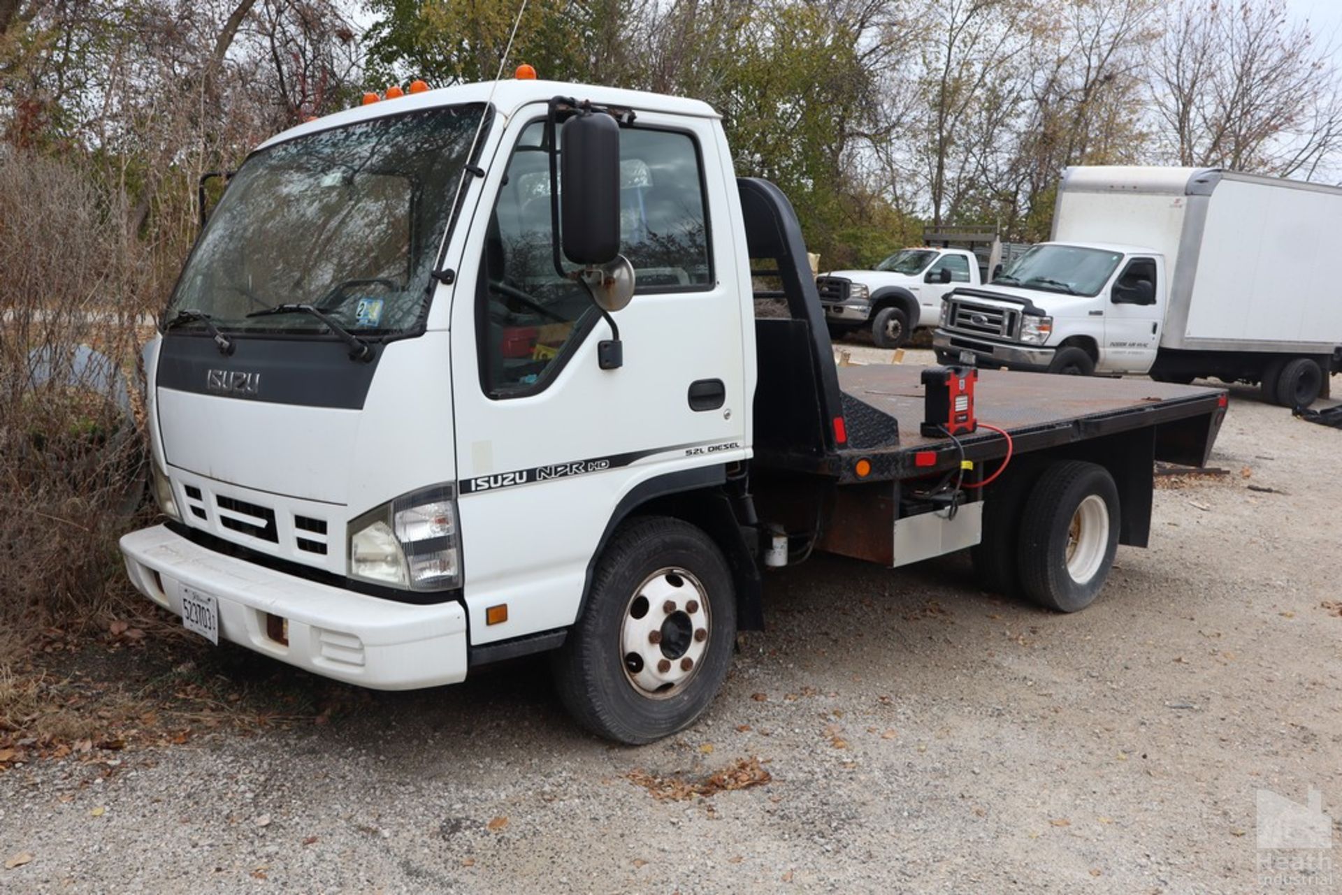 2006 ISUZU MODEL NPRHD-5.2 L DIESEL DUALLY FLATBED TRUCK 92" X 136" BED, 2" HIGH RECEIVER, 134,028