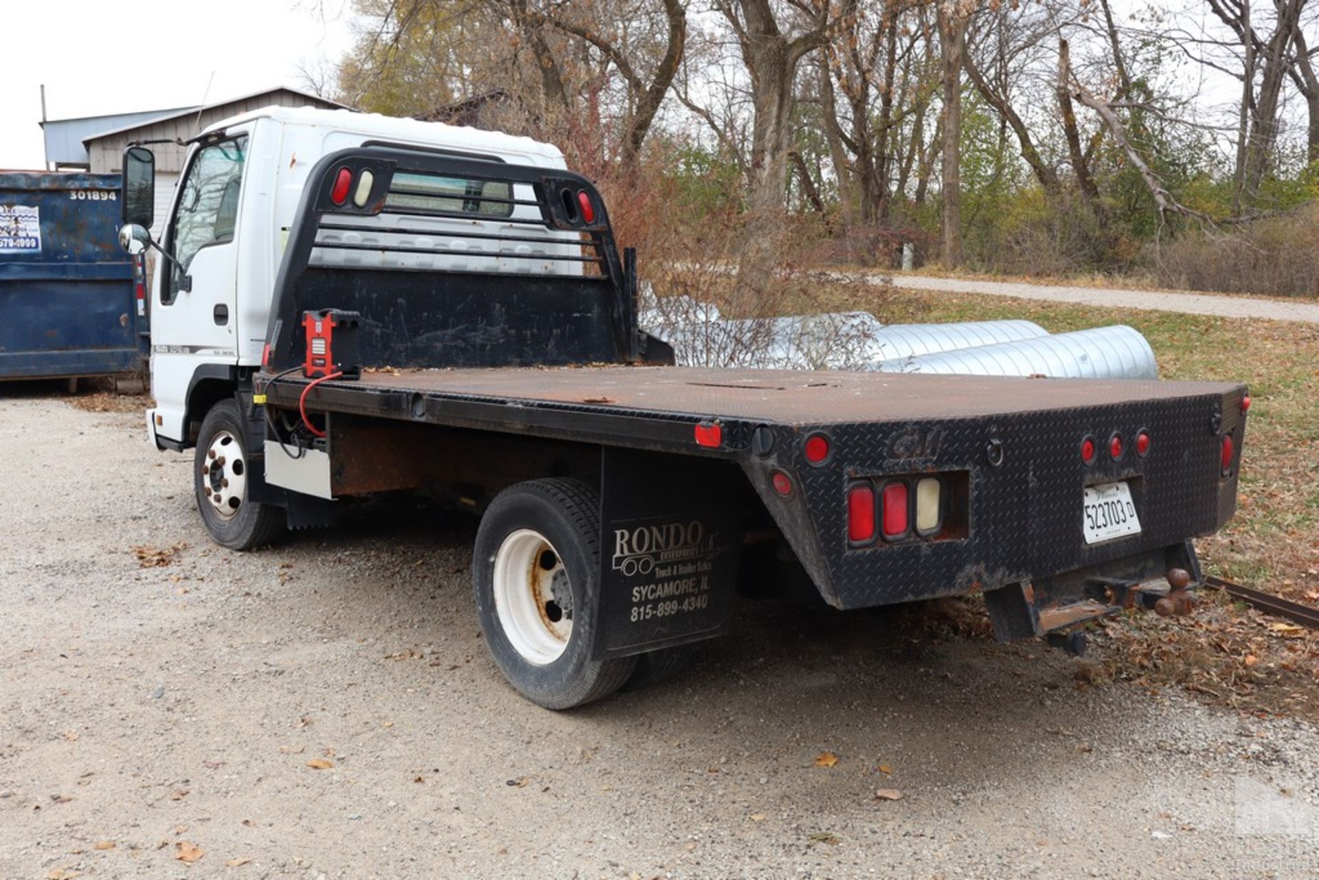 2006 ISUZU MODEL NPRHD-5.2 L DIESEL DUALLY FLATBED TRUCK 92" X 136" BED, 2" HIGH RECEIVER, 134,028 - Image 3 of 11