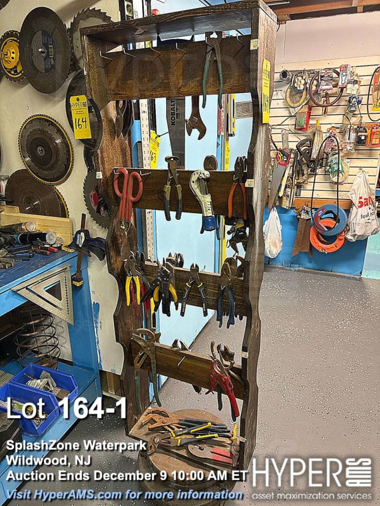 Lot of pliers, cutters, misc hand tools with stand