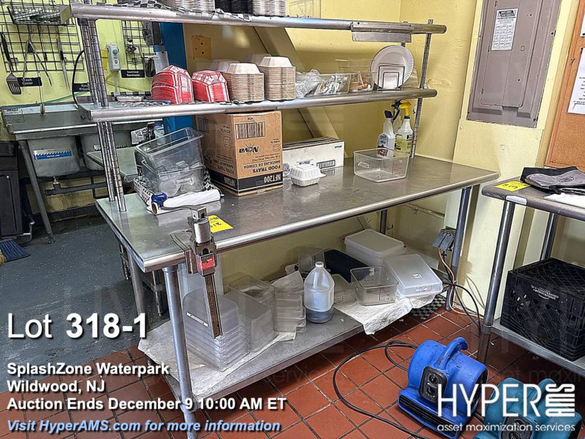 Lot 6' stainless work table with shelf and can opener attachment