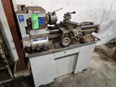 TAKANG LATHE, SWING OVER BED 10 IN., SWING OVER SADDLE 5 IN., 24 IN. CENTERS, 1 IN. BORE.