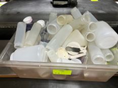 Bin of misc. jars & squeeze bottles