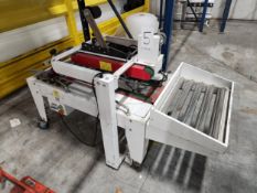 Case Sealer Top Tape Application Rigging and Removal Fee: $100.00