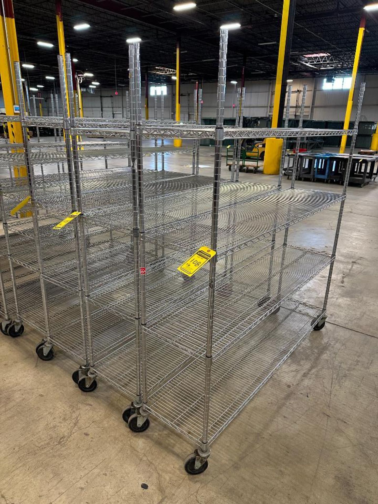 Metri Raksh { Choice of lots: 107, 108 } (6) Assorted Size Rolling Metro Racks ($10 ...