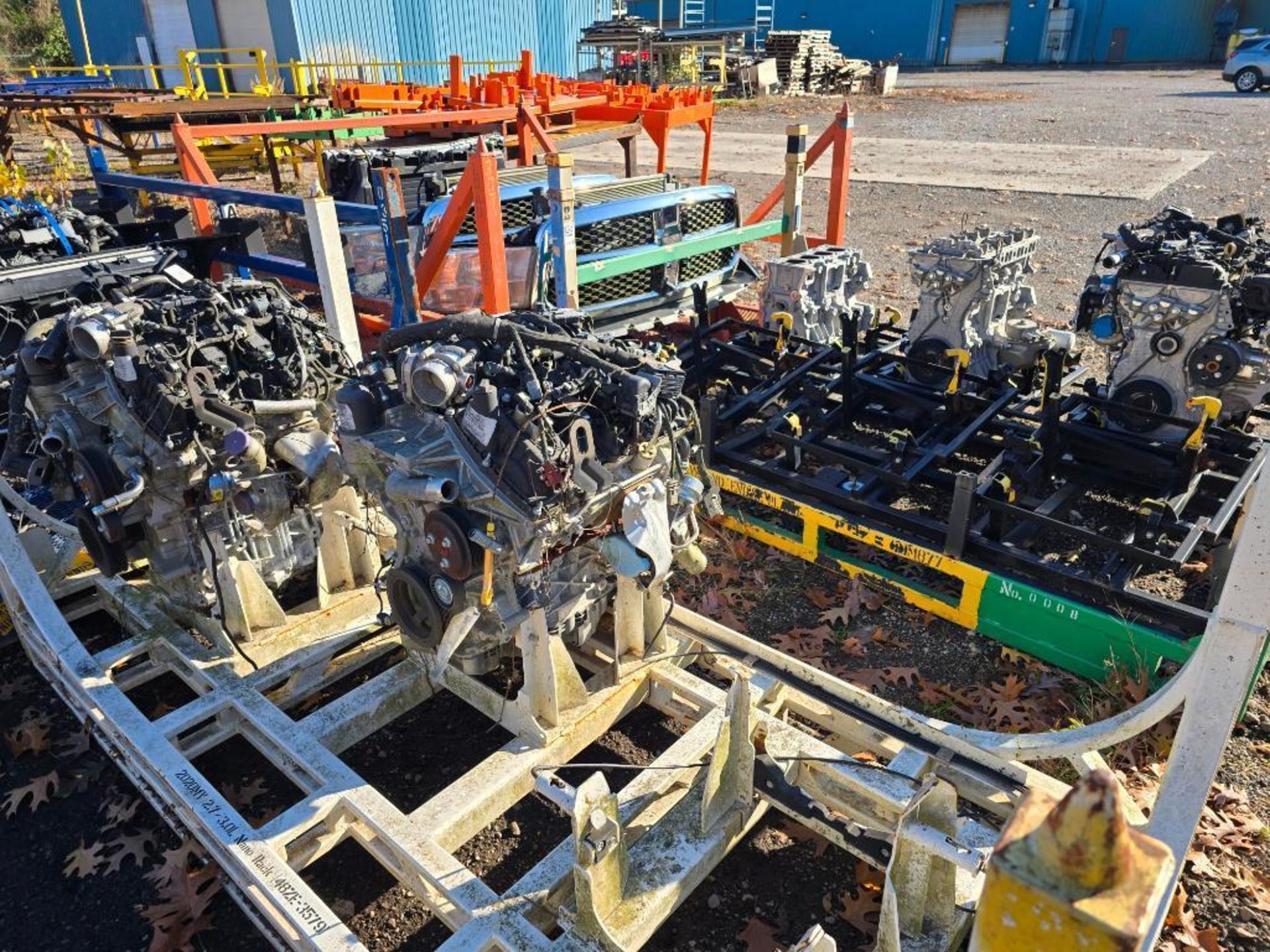 (4) Racks w/ (5) Ford Test Engines & (6) Dodge Truck Front End ...