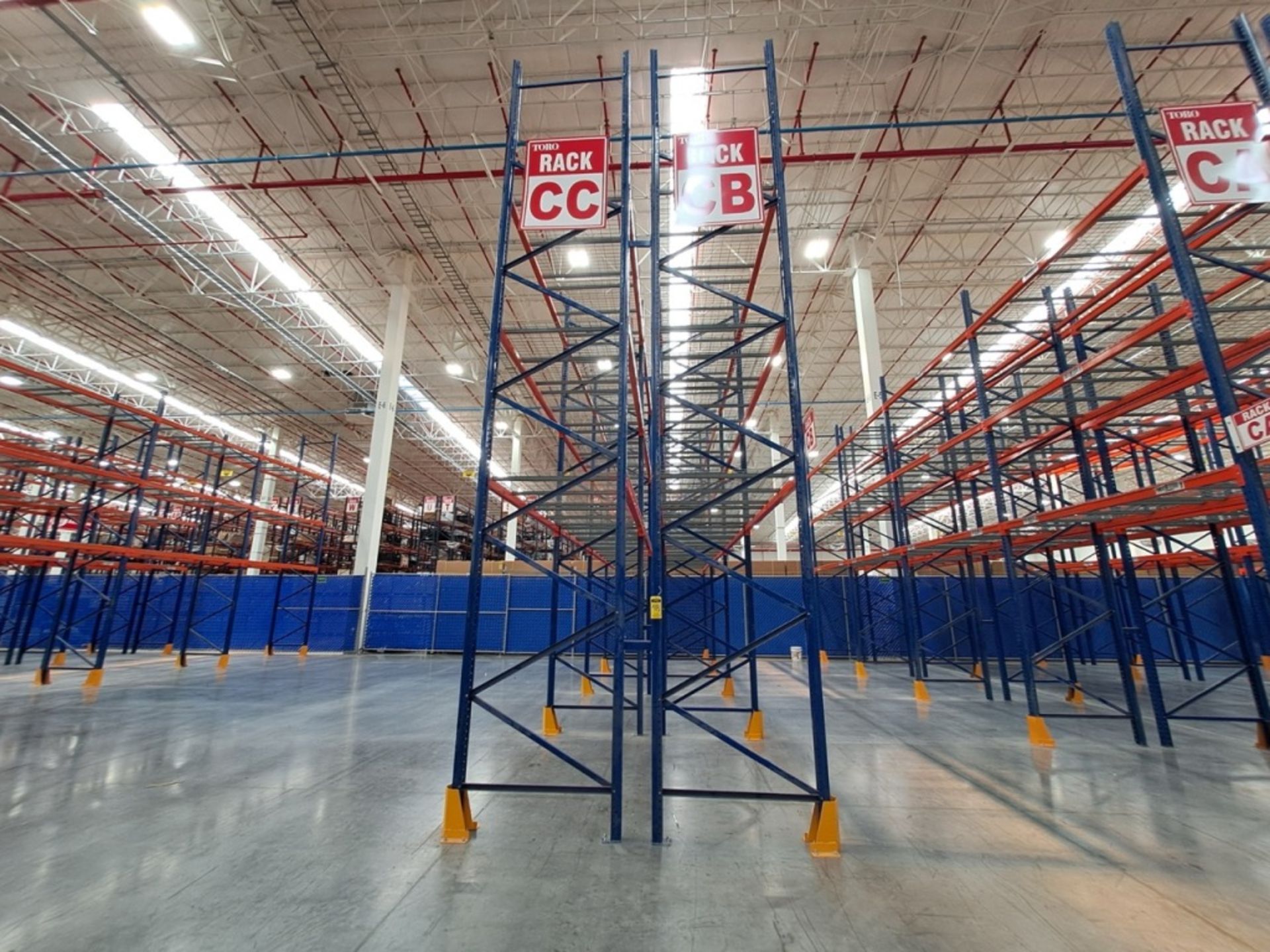 2 rows of storage racks measuring 11 meters long, 6 meters high, and 1. ...