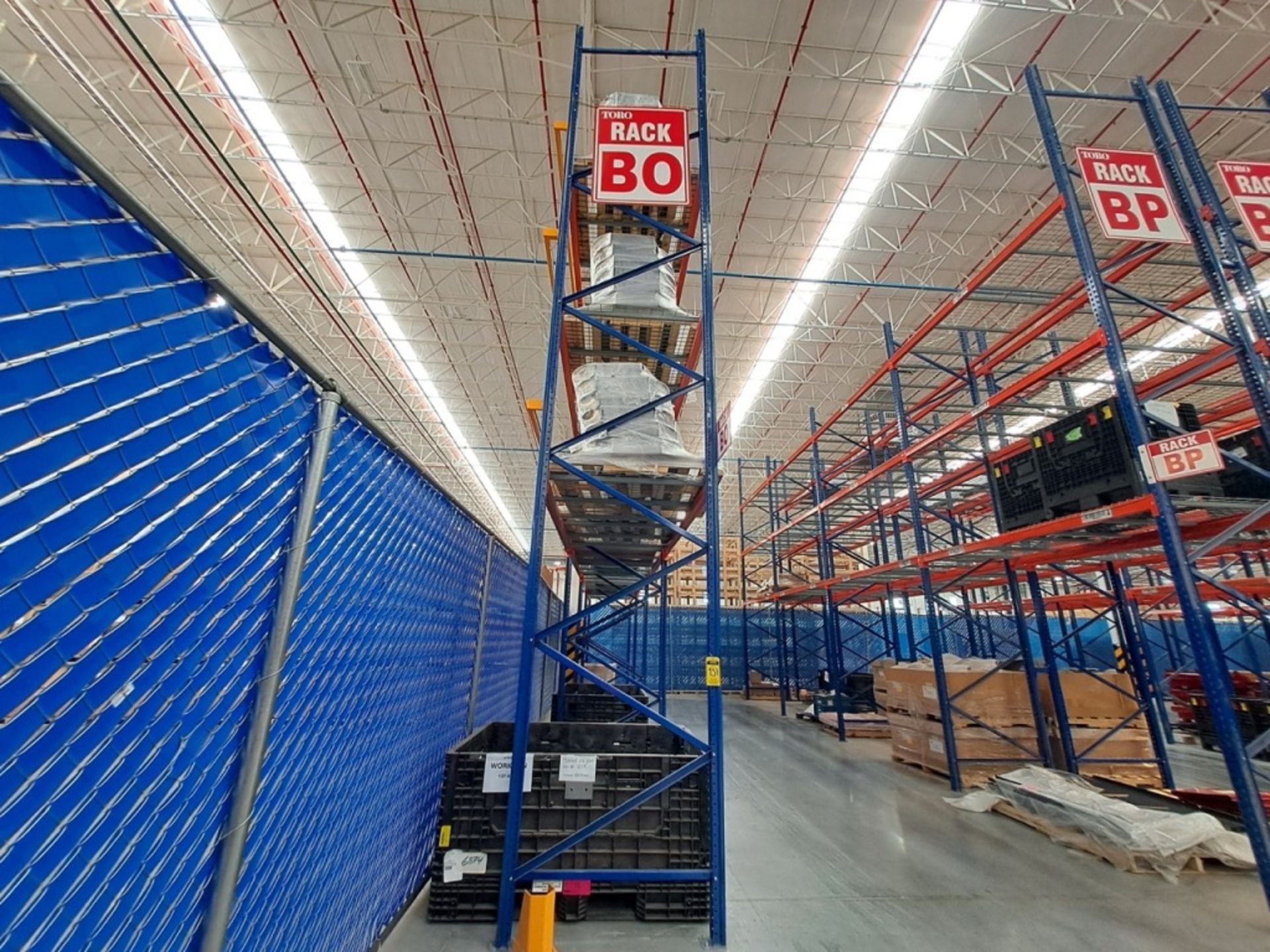 2 rows of storage racks measuring 11 meters long, 6 meters high, and 1. ...